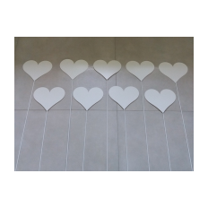 Painted metal hearts on rods