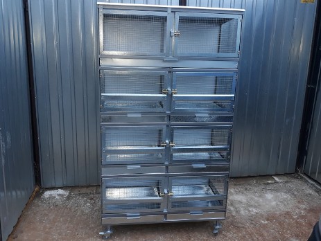 Vet cage with trays and wheels