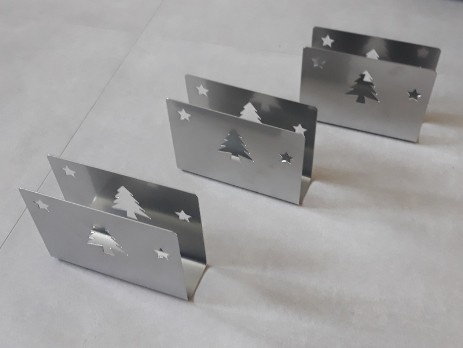 Silver napkin holders with Christmas tree