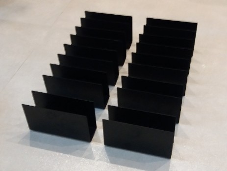 Black napkin holders with solid walls
