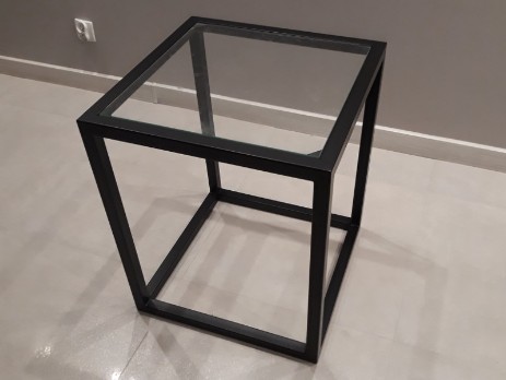 Metal table with glass top