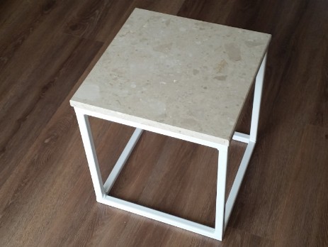 Metal table with agglomarble top