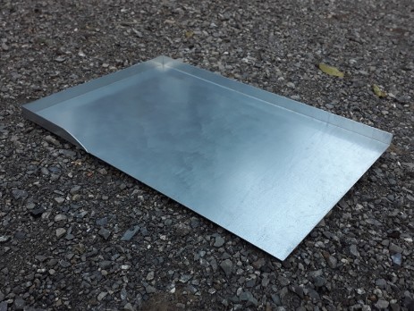 Asymmetrical cut tray of galvanized sheet