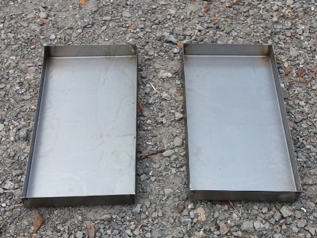 Trays of carbon steel sheet